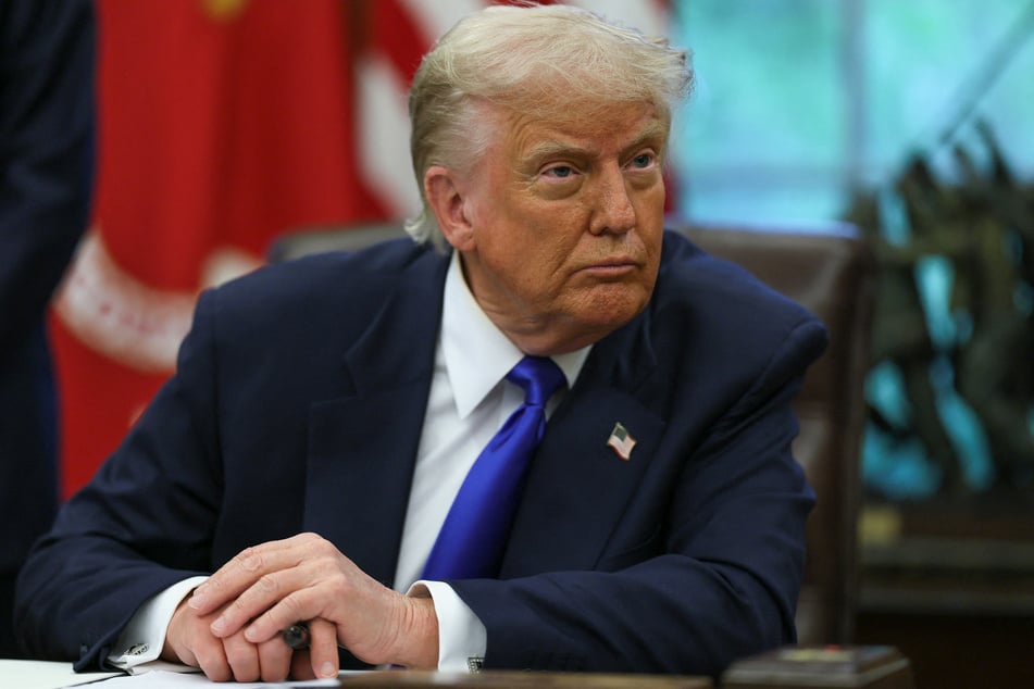 President Donald Trump's administration has been ordered to admit some 12,000 refugees whose applications had already been approved.