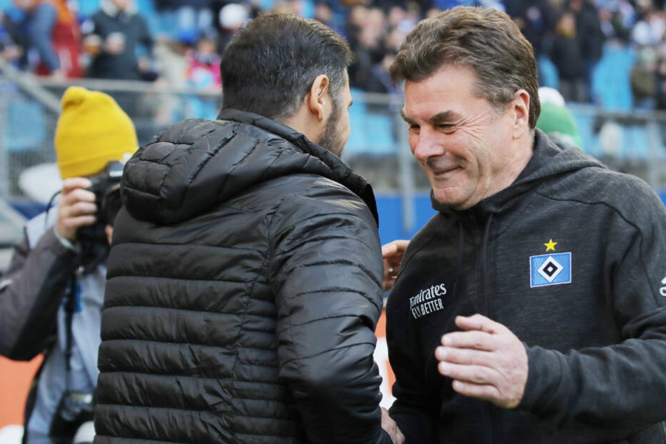Herzliche Begrüßung: HSV-Coach Dieter Hecking (r.) und Dresdens Cristian Fiel vor Anpfiff der Partie.