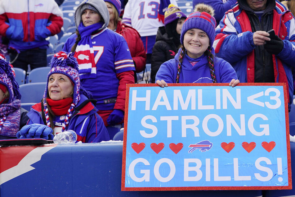 Buffalo Bills fans show their support for safety Damar Hamlin, who is recovering from a cardiac arrest.