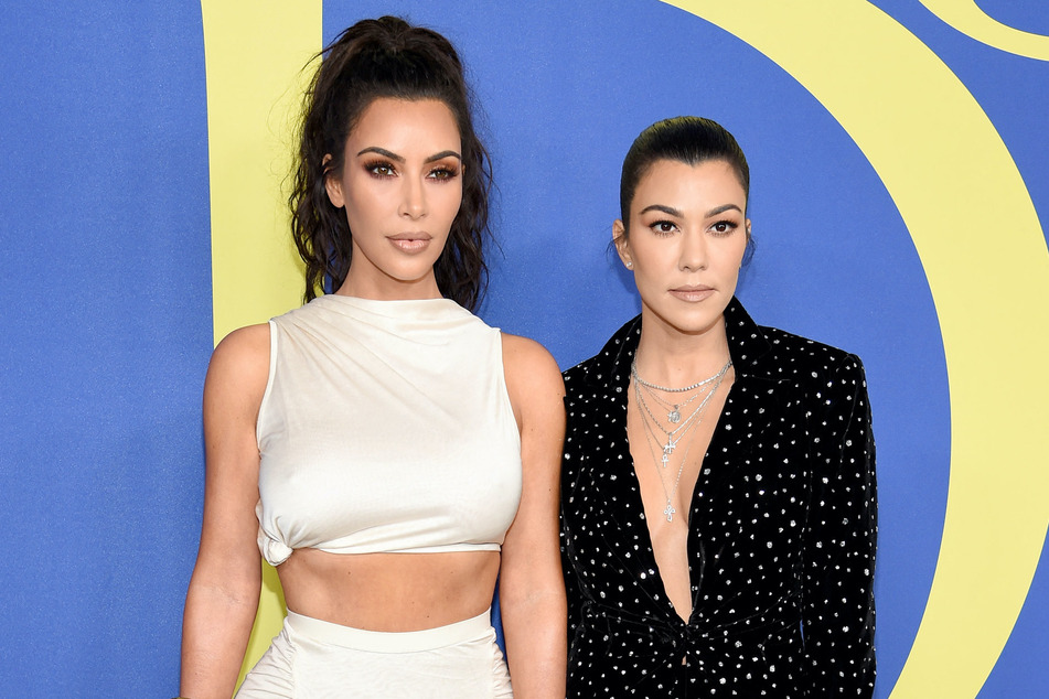 Kim Kardashian (l) and Kourtney Kardashian's relationship remains fractured in the new trailer for The Kardashians season 4.