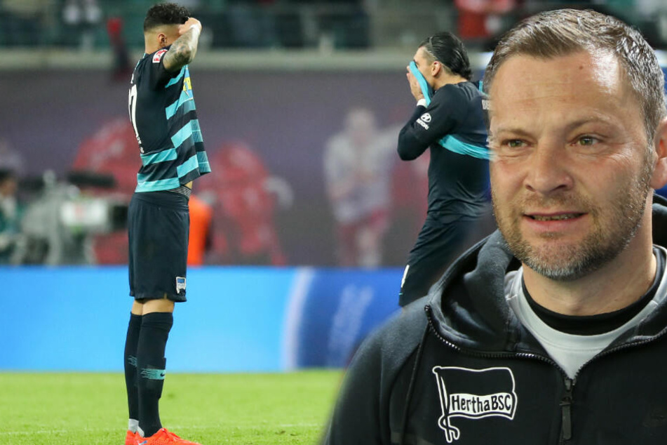 Pal Dardai und seine Schützlinge Davie Selke und Karim Rekik können die Klatsche nicht fassen.