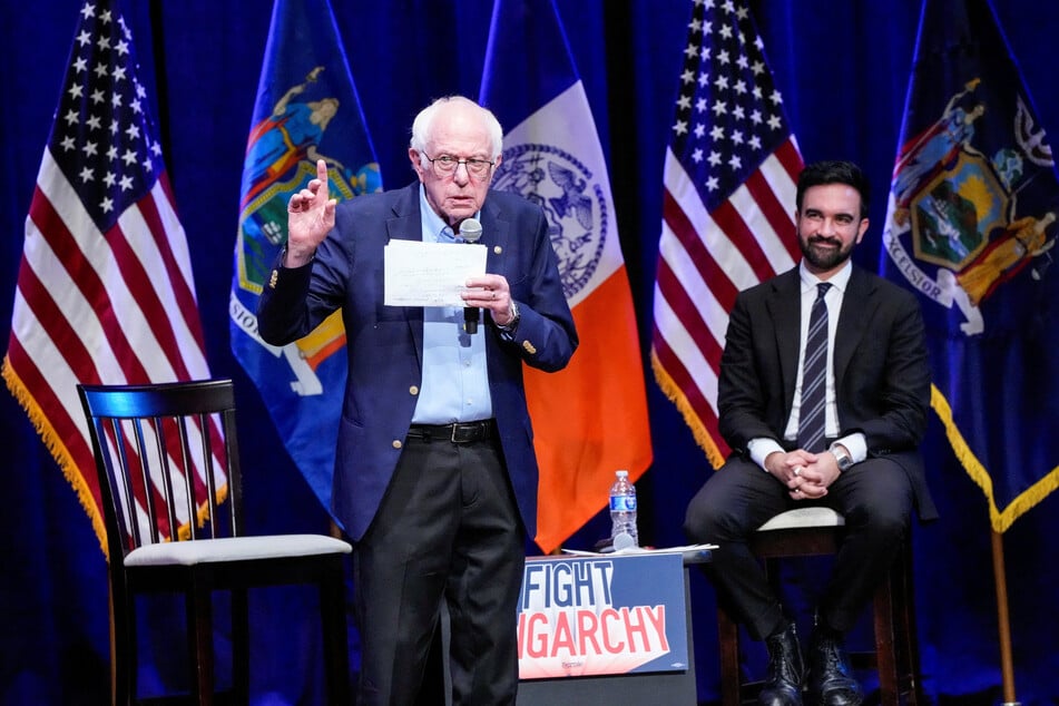 Senator Bernie Sanders (l.) speaks next to New York City mayoral candidate Zohran Mamdani on stage at Brooklyn College on September 6, 2025.