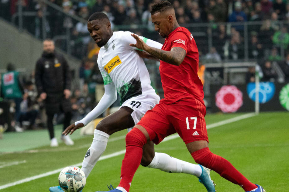 Jérôme Boateng (r.) musste gegen Mönchengladbach vorzeitig vom Feld.