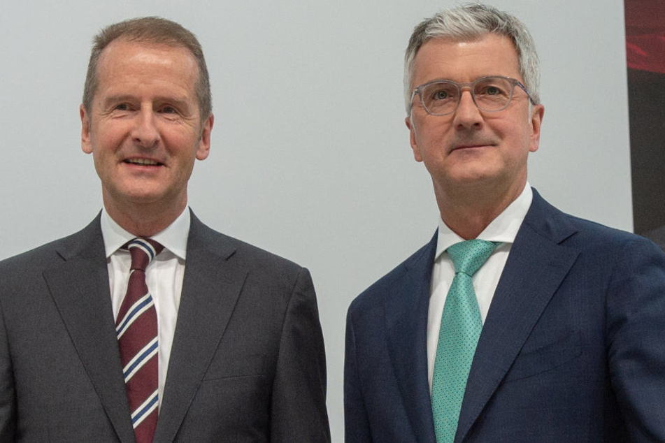 VW-Chef Herbert Diess (l.) zeigte sich geschockt über die Verhaftung von Audi-Vorstandschef Rupert Stadler (r.).