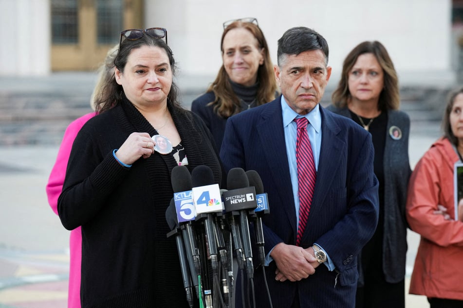 Attorney Matthew Bergman looks on as one of the parents who say they lost their child because of social media speaks outside the court in Los Angeles, California, on February 18, 2026.