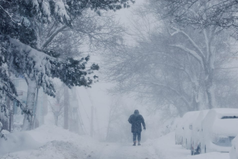 Northeast sees more power outages and school closures after massive snowstorm