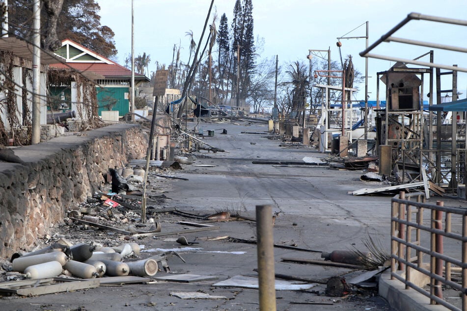 Burned debris litters the streets after wildfires devastated the historic town of Lahaina, Maui, Hawaii.