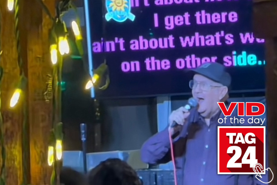 This older man named Dennis entertained a crowd of people at a bar while singing The Climb by Miley Cyrus in today's Viral Video of the Day!