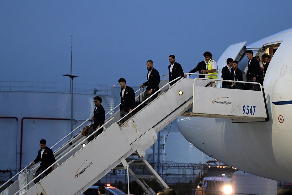 Iran's players disembark on arrival at the Tijuana International Airport in Tijuana, Mexico, on Sunday ahead of the FIFA 2026 World Cup.
