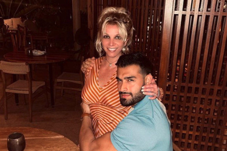 Britney Spears (l) and Sam Ashgari officially wed last month at the singer's Thousand Oaks home.