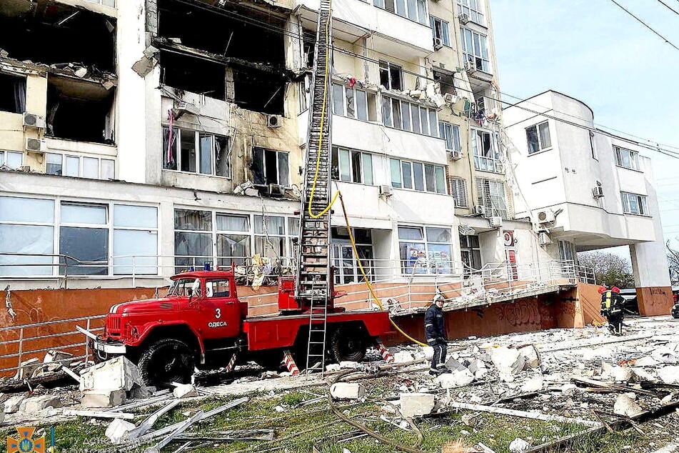 Ukrainian emergency services in action after a Russian attack on Odessa.