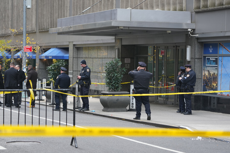 Police swarmed the scene of a shooting that killed Brian Thompson, the chief executive of health insurance giant UnitedHealthcare.