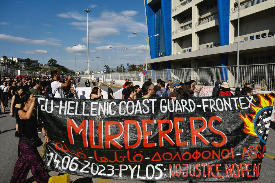 Protesters in front of the Frontex and Hellenic Coastguard headquarters in the port of Piraeus, near Athens, Greece, on June 18.
