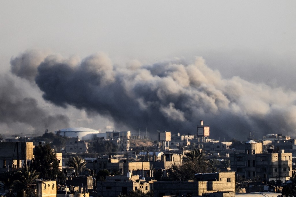Smoke billows during Israeli bombardment over Khan Younis in the southern Gaza Strip on January 22, 2024.