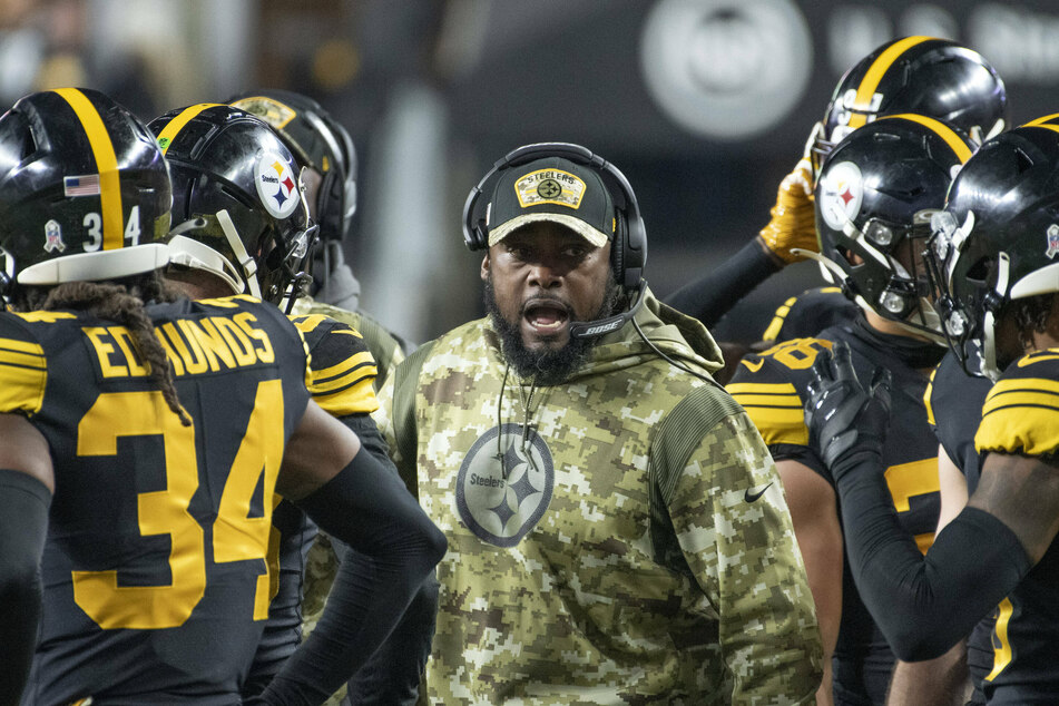 Pittsburgh Steelers head coach Mike Tomlin (c) calls out to his defense during a timeout.