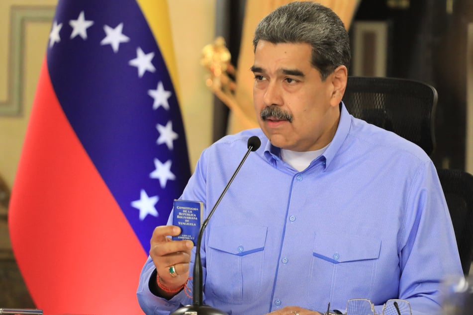 This handout picture released by the Venezuelan Presidency press office on September 23, 2025, shows Venezuela's President Nicolas Maduro speaking during a meeting with the Executive Committee of the State Council of the Nation at the Miraflores Presidential Palace in Caracas.