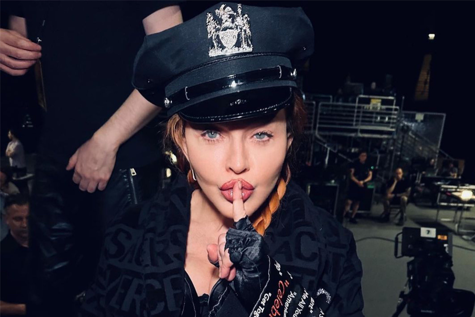 Madonna has postponed her Celebration world tour due to her health scare.