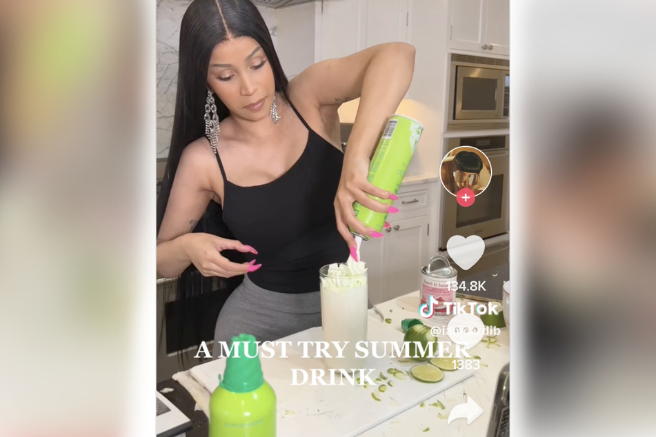 Cardi adds the final touch: her newest Whipshots flavor, lime!