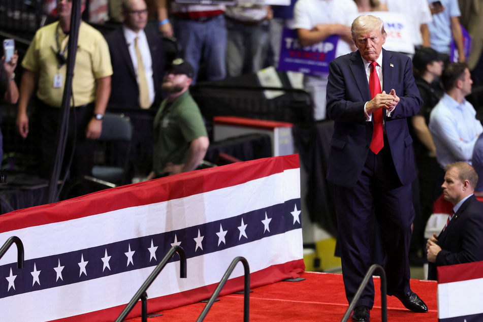 Donald Trump looks on during a campaign rally in Grand Rapids, Michigan.