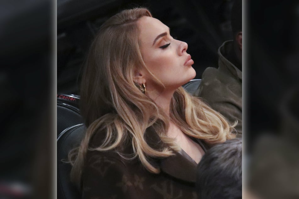 Adele attending the first NBA regular season game between the Lakers and the Warriors in October.
