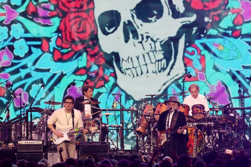 Rock band Dead &amp; Company – former Grateful Dead members Bob Weir and Mickey Hart, along with John Mayer, Oteil Burbridge, Jeff Chimenti, and Jay Lane – perform during the 2025 MusiCares Person of the Year benefit gala at the Los Angeles Convention Center.