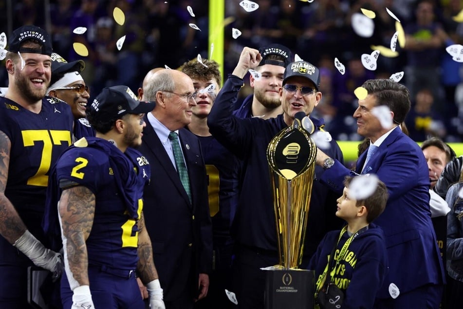 Michigan wraps up "unfinished business" in CFP championship game amid refereeing controversy