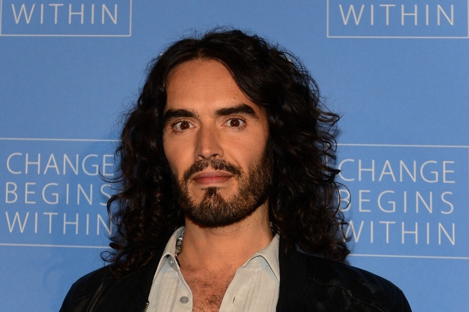 British actor and comedian Russell Brand is accused of flashing a woman before laughing about it on his radio show.