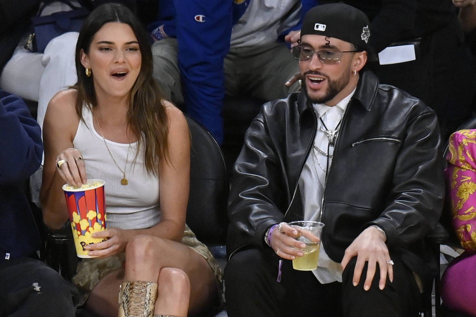 Kendall Jenner is apparently devastated over her sudden split from Bad Bunny (r).