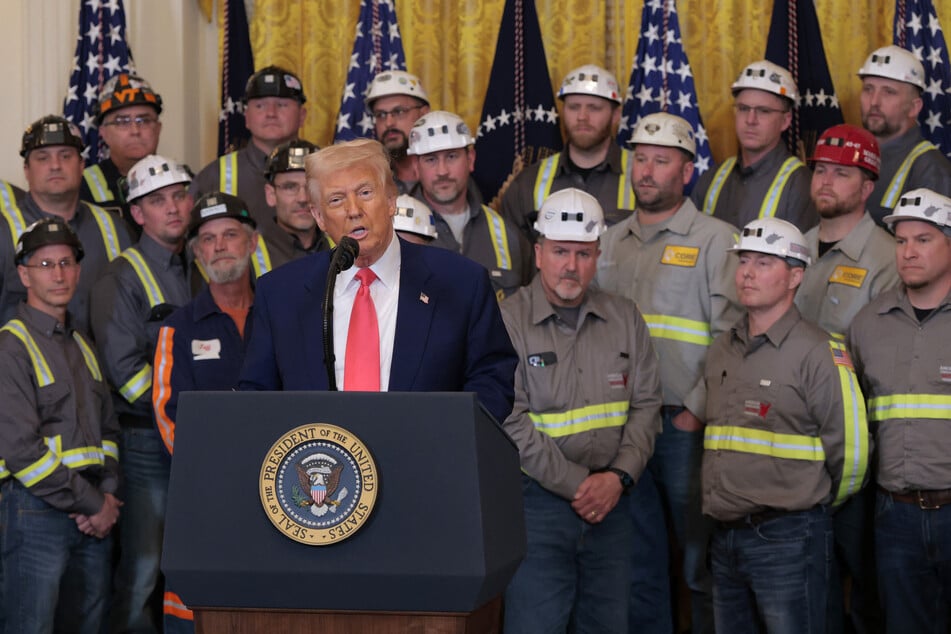 US President Donald Trump speaks alongside coal and energy workers during an executive order signing ceremony in the East Room of the White House on April 8, 2025 in Washington, DC.