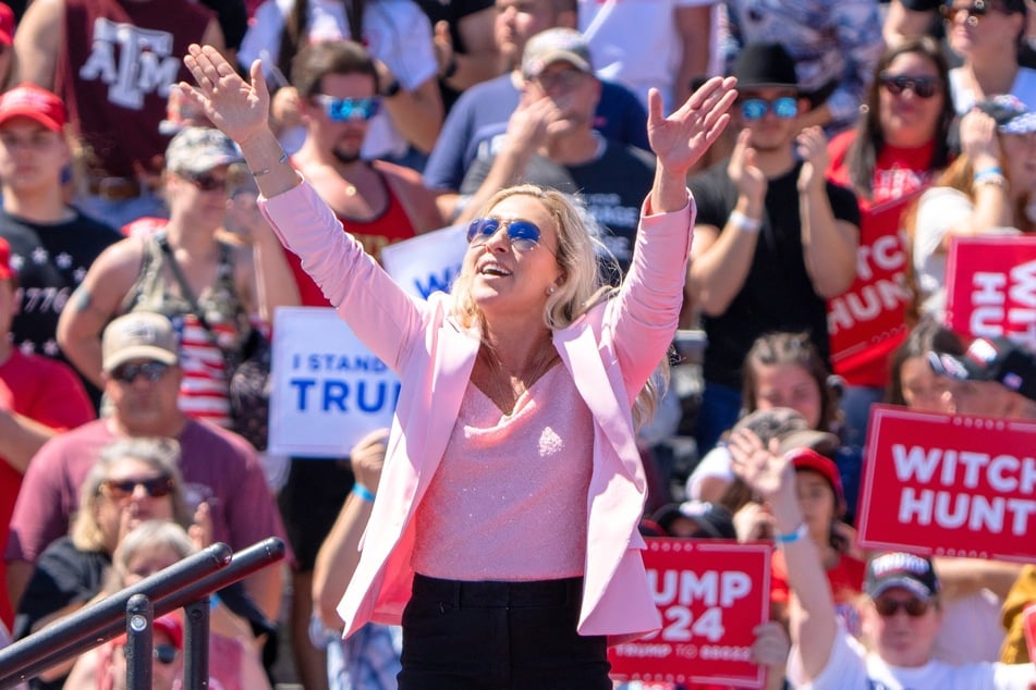 Marjorie Taylor Greene waving at the crowd during a rally for Donald Trump in Waco, Texas on March 25, 2023.