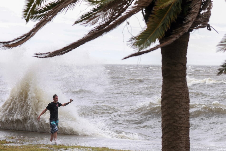 While scientists can link some extreme weather events directly to human-caused global warming, it remains too early to draw clear conclusions about this sodden month.