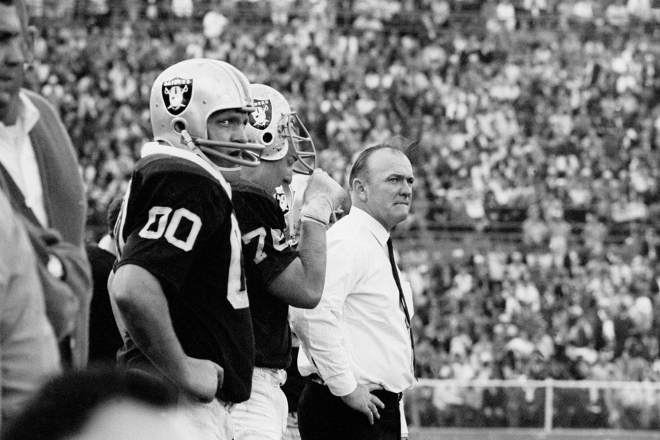 Oakland Raiders head coach John Rauch on the sidelines with center Jim Otto (00) in Super Bowl II against the Green Bay Packers at the Orange Bowl.