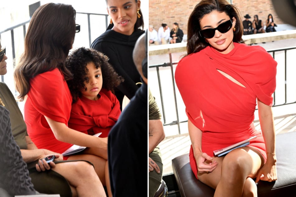 Kylie Jenner (r) and her five-year-old daughter Stormi stunned in matching red-colored dresses at a France fashion show Monday night!
