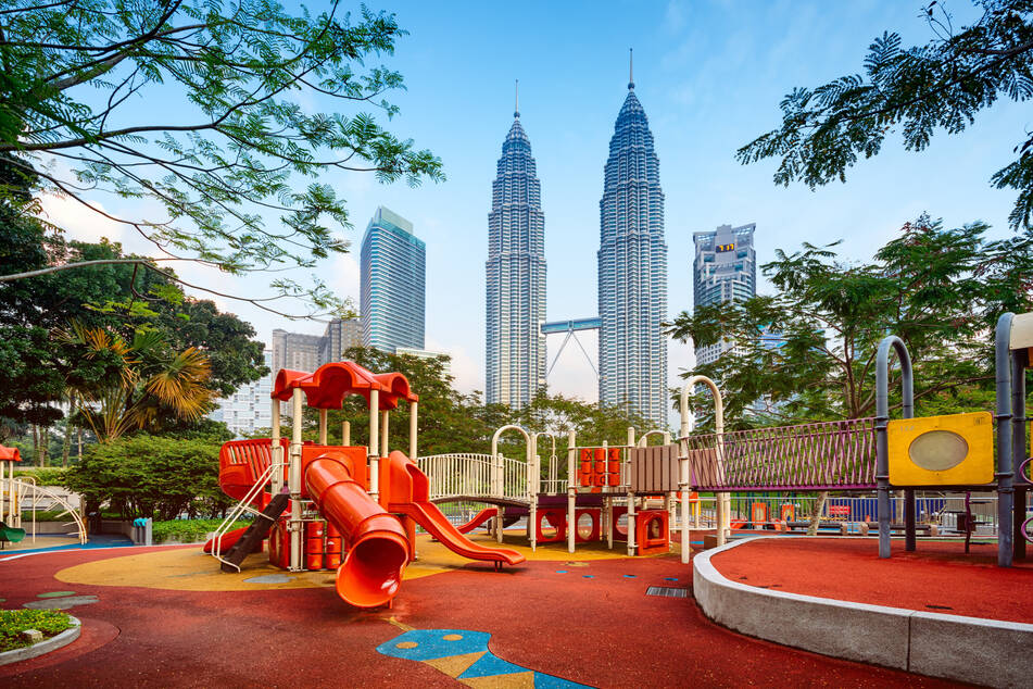 Überragen Kuala Lumpur gleich doppelt: Die Petronas Towers sind mit 452 Metern die höchsten Zwillingstürme der Welt.