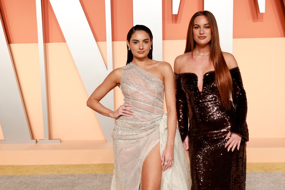 (L-R) Paige DeSorbo and Hannah Berner attend the 2025 Vanity Fair Oscar Party Hosted By Radhika Jones at Wallis Annenberg Center for the Performing Arts on March 2, 2025 in Beverly Hills, California.