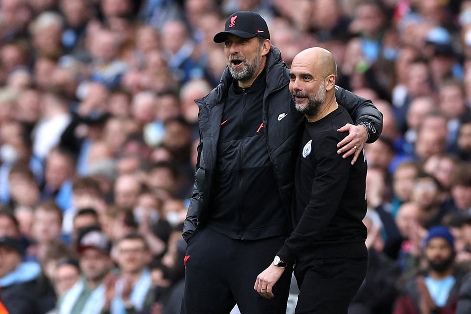 Liverpool's Jürgen Klopp (l.) and City's Pep Guardiola get close during their sides' 2-2 draw in the English Premier League on Sunday.