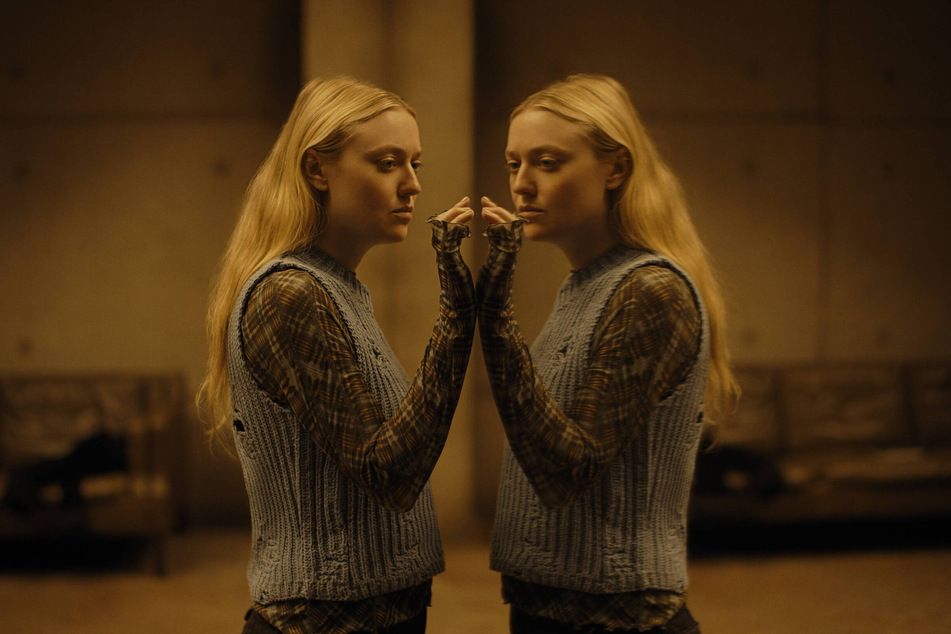 Dakota Fanning must survive the night with a group of strangers as the all are being "watched" by evil lurking in the woods in the new horror flick, The Watchers.