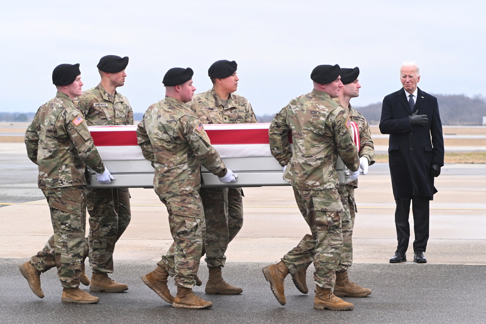 President Joe Biden attends the transfer of the remains of three US service members killed in the drone attack on the US military outpost in Jordan, at Dover Air Force Base in Dover, Delaware on Friday.