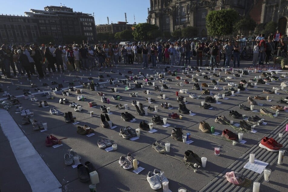 Pairs of shoes are pictured during a vigil at the Zócalo square in Mexico City on March 15, 2025.