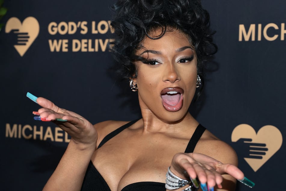 Megan Thee Stallion donned at stylish little black dress while being honored at the Golden Heart Awards in NYC.