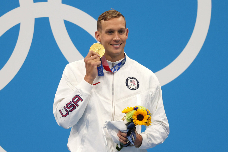Caeleb Dressel won his third gold medal at the Tokyo Games as he came in first and set a world record during Saturday's 100-meter butterfly final.