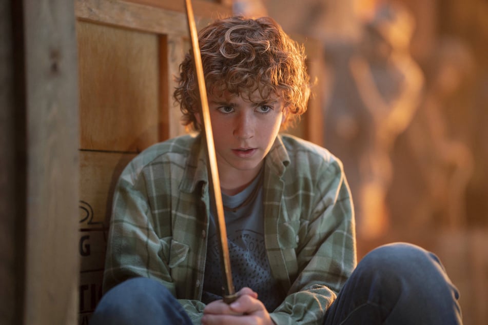 Walker Scobell stars as Percy Jackson, the 12-year-old demi-god who is accused of stealing Zeus' lightning bolt in the upcoming TV series, Percy Jackson and the Olympians.