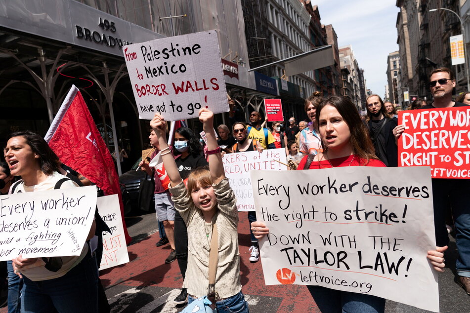 Protesters rally in New York City on International Workers' Day on May 1, 2022.
