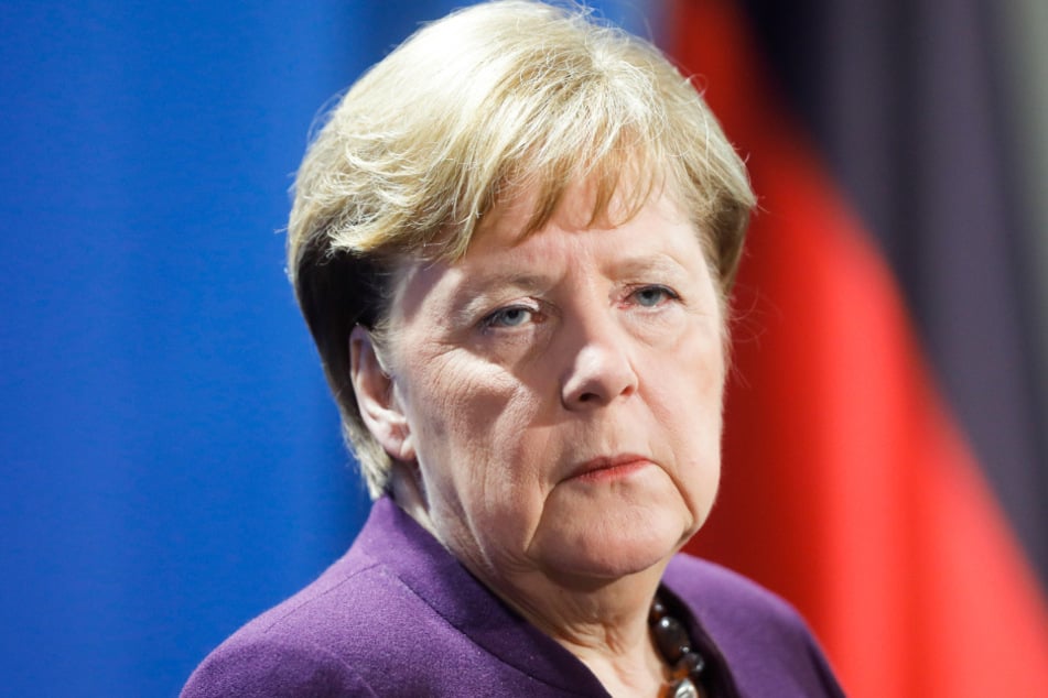 Bundeskanzlerin Merkel (65, CDU). 
