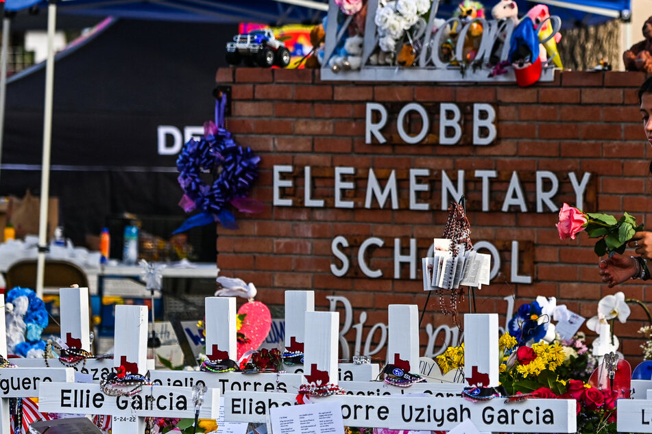 Relatives of children killed or wounded by a mass shooter in Uvalde two years ago have reached a $2 million settlement with the Texas city.