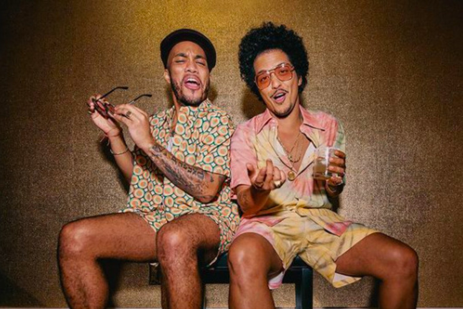 Anderson .Paak (l) and Bruno Mars recently announced their new band Silk Sonic by dropping a single called "Leave The Door Open".