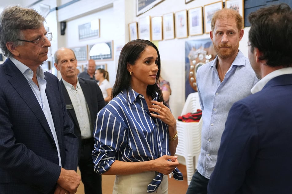 Prince Harry (r.) and Meghan Markle spoke with survivors of the deadly mass shooting at Australia's Bondi Beach last year.
