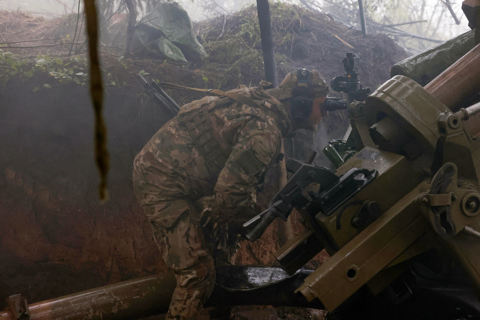 A Ukrainian soldier on the front lines in the Luhansk region of Ukraine, where new explosions were reported.