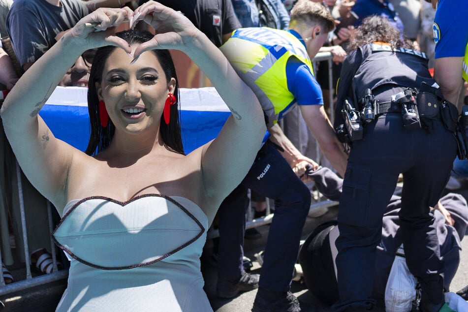 "Head off" gesture for Israel singer? Palestine demonstrator arrested