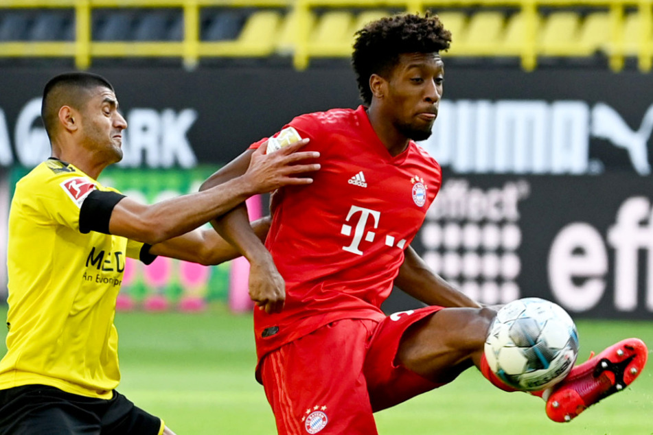 FCB-Flügelflitzer Kingsley Coman behauptet den Ball gegen Dortmunds Mahmoud Dahoud (l.).